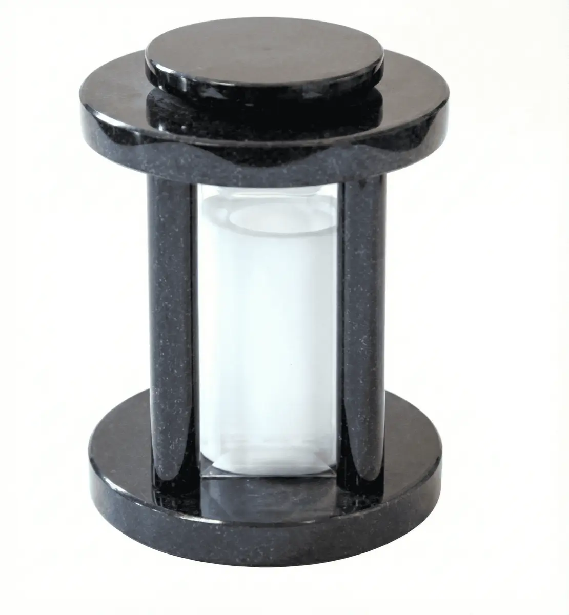Rounded black granite memorial lantern with three pillars and a central glass candle cylinder.