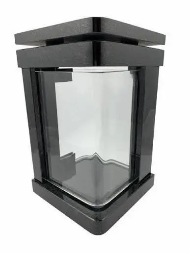 Modern black granite memorial lantern with an angled top and clear glass panels.