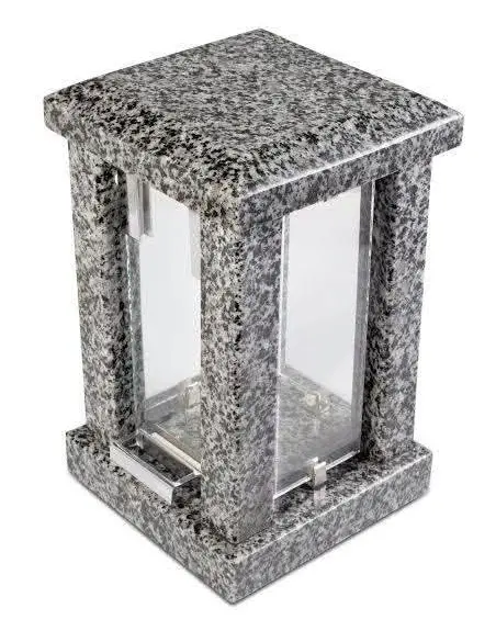 Light grey rectangular granite memorial lantern with four clear glass sides and a solid top.